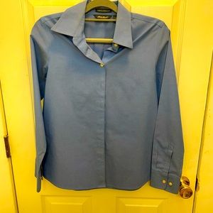 Woman’s lightly worn blouse.